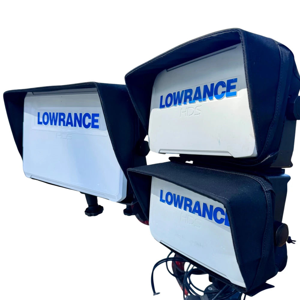 Three Lowrance sounder covered by black Rusler Sounder covers
