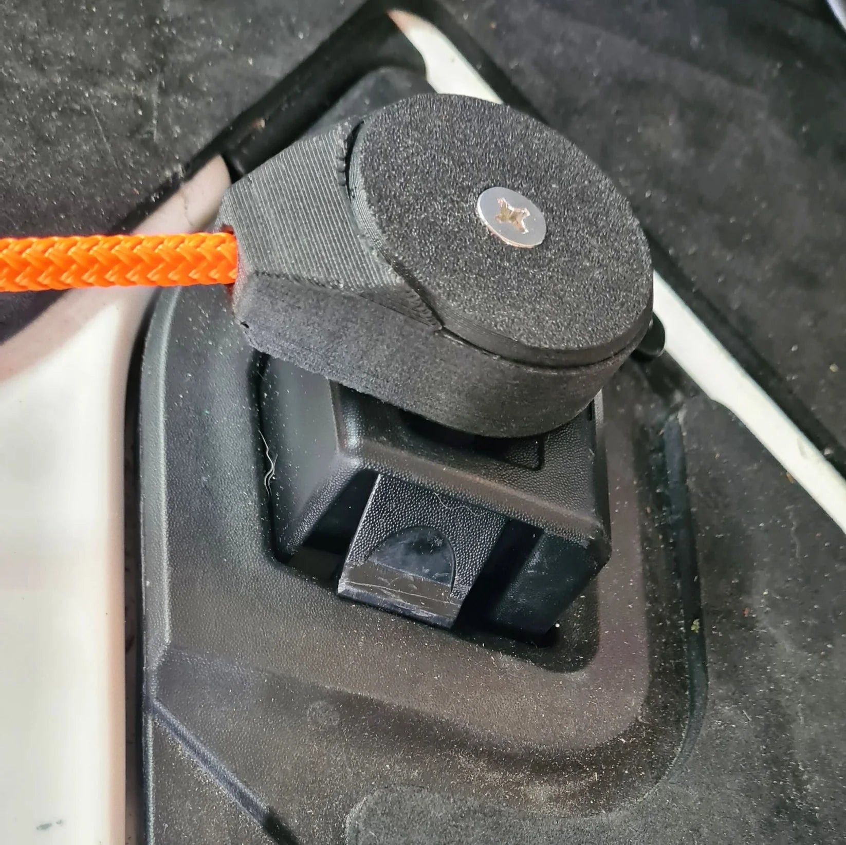 Sea-Doo LinQ docking puck and tether fitted for securing a jet ski to a dock